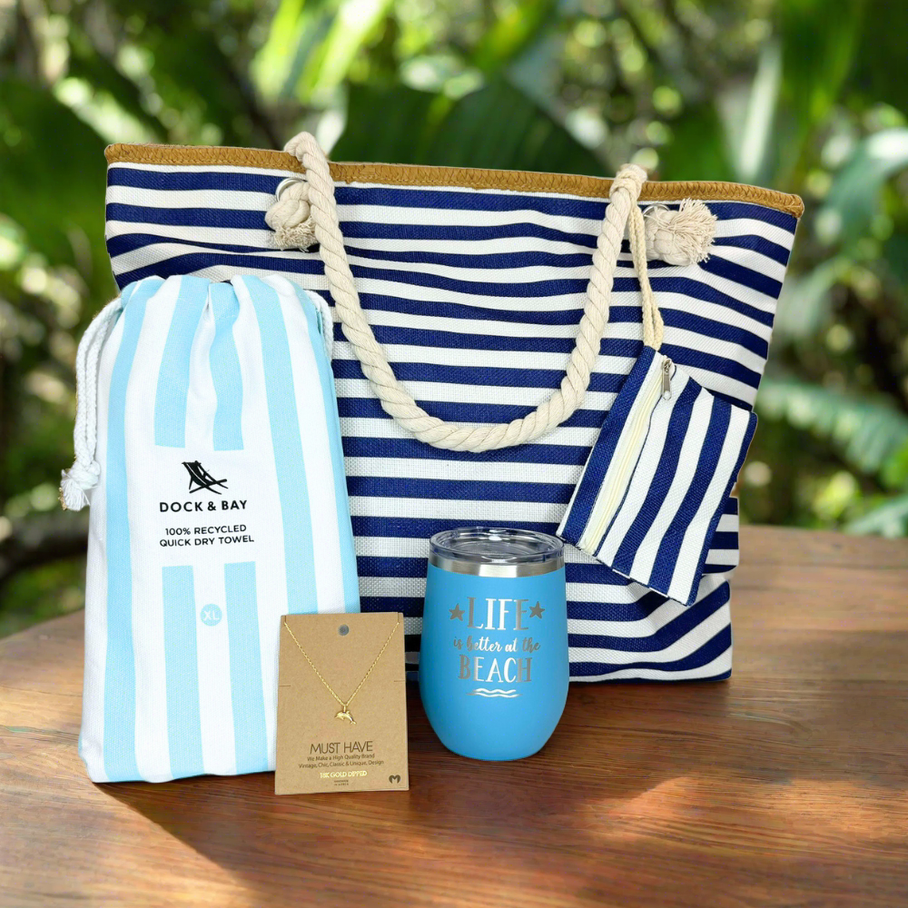 Nautical Beach Lover Gift Set, including a stylish tote bag, 18k gold dolphin pendant necklace, quick-dry towel, and ocean blue insulated tumbler for beach days