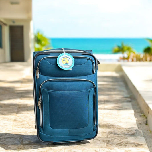 Round beach luggage tag with contact info card, shown on suitcase handle