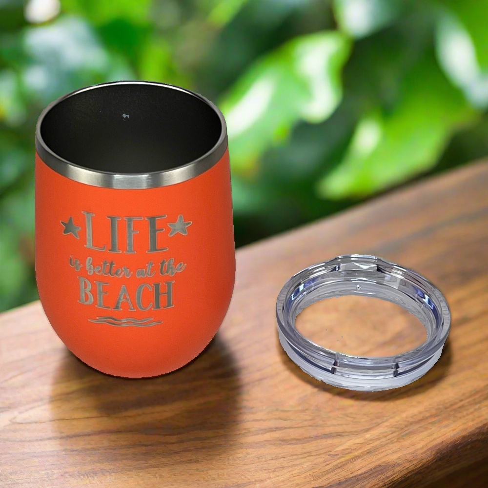 Life is Better at the Beach" engraved coral tumbler, ideal for keeping drinks hot or cold