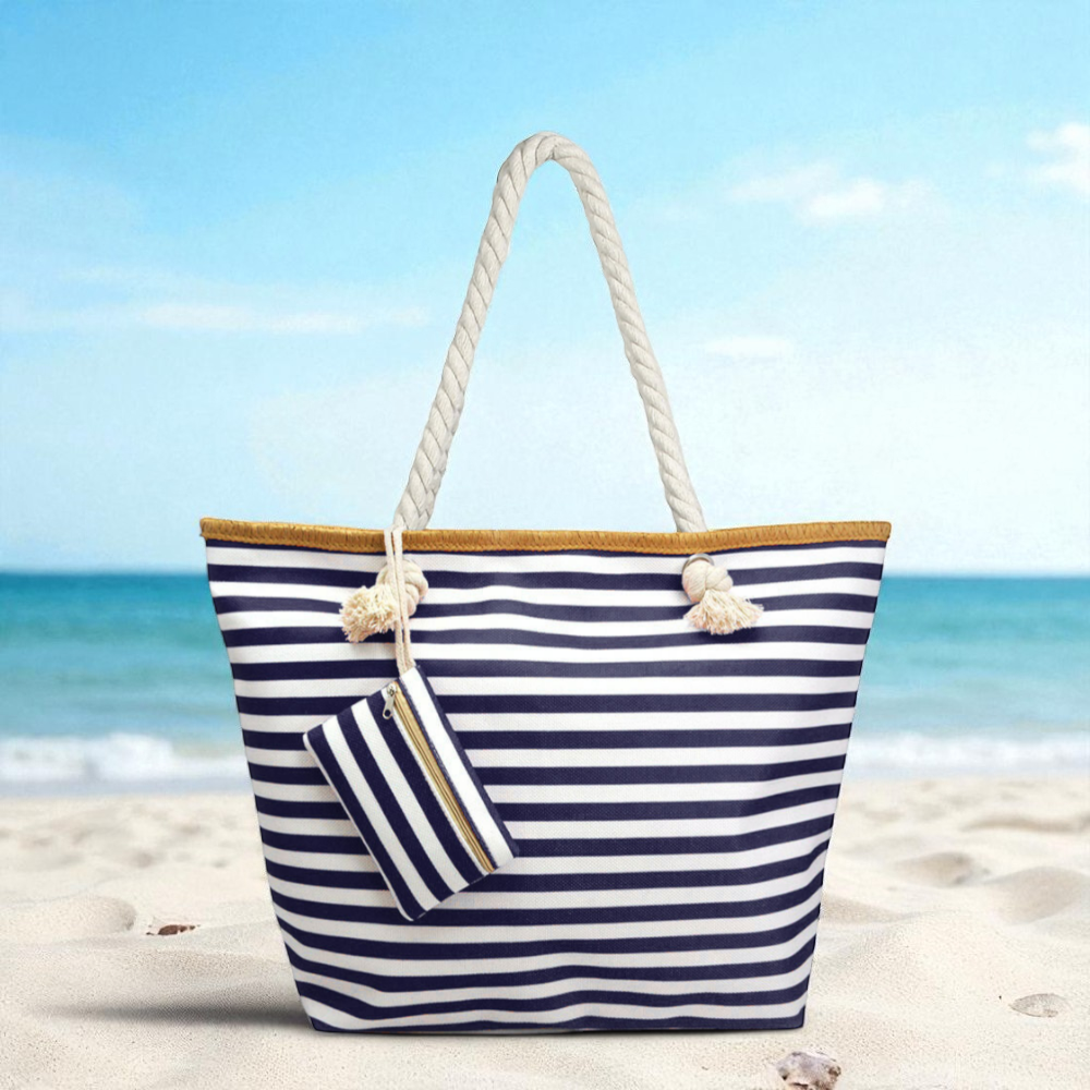 nautical, Navy and white striped tote bag with rope handle on a beach