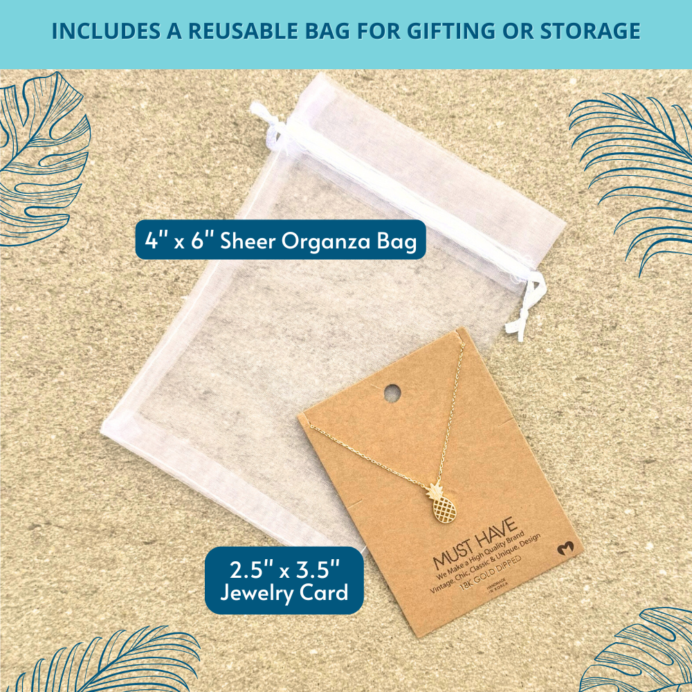 18k gold dipped pineapple necklace shown with white organza bag – includes reusable bag for gifting or everyday storage