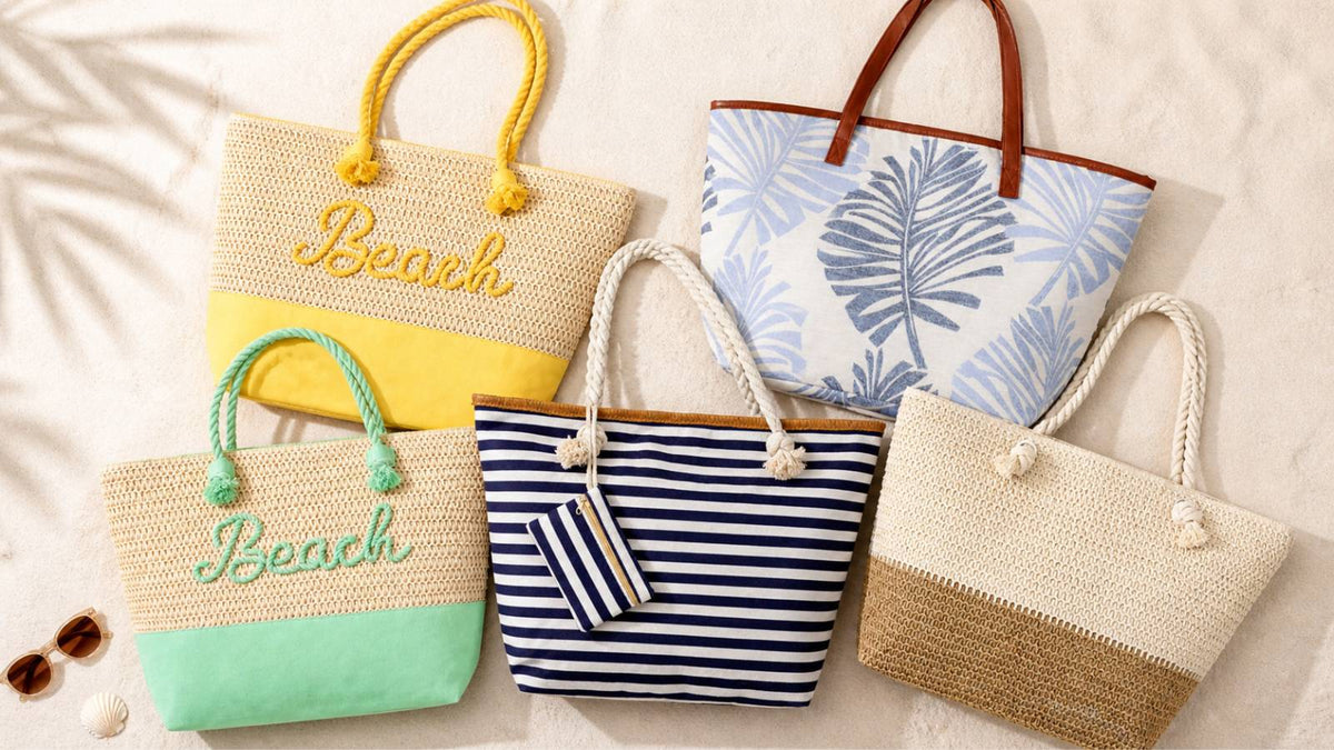 Five cute beach bags with zipper from Breezy Cove — straw totes, navy stripe, and palm leaf canvas styles