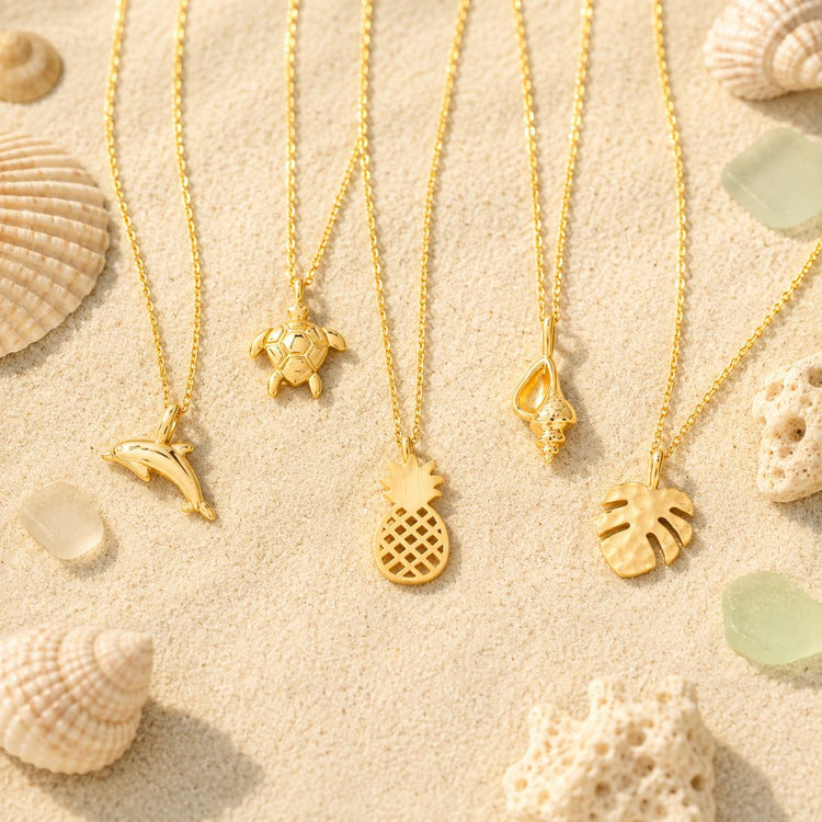 18k gold dipped pineapple beach themed necklace in a vanity setting with mirror