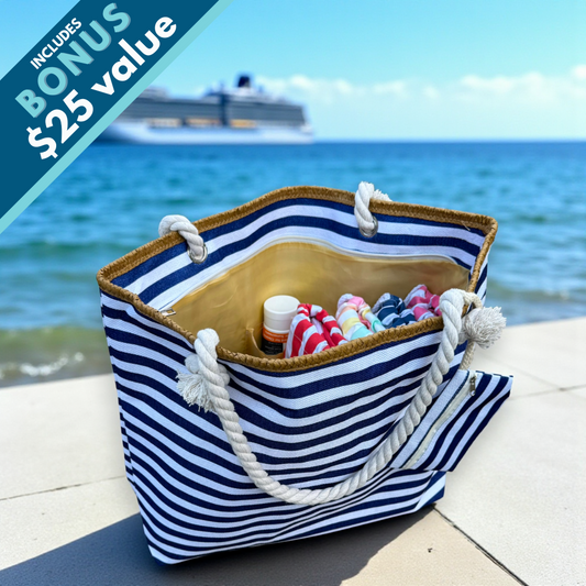Navy and white striped beach bag with zipper shown in bright coastal setting with cruise ship and ocean view in background