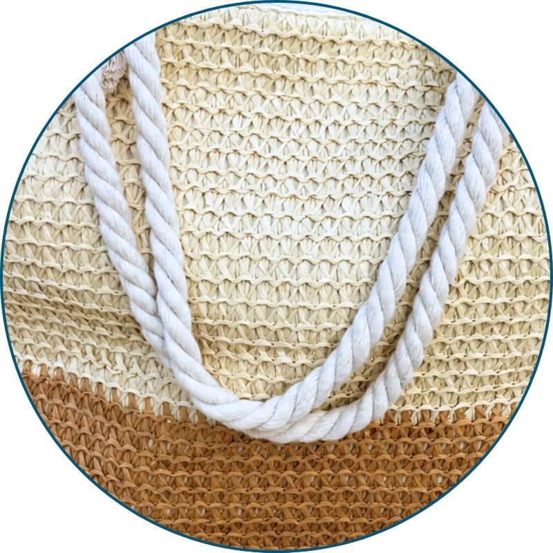 Cute straw beach bags with soft rope handles ready for a beach day.