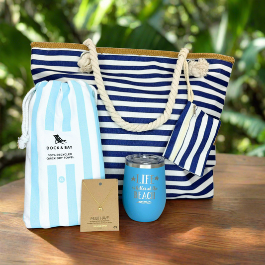 Nautical Beach Lover Gift Set, including a stylish tote bag, 18k gold dolphin pendant necklace, quick-dry towel, and ocean blue insulated tumbler for beach days