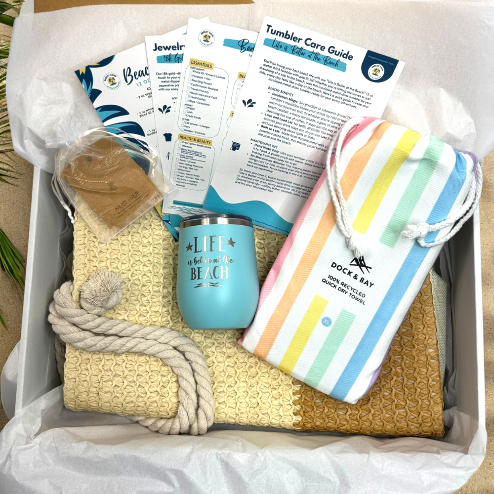 Pastel Beach Lover Gift Set with straw beach bag, pastel rainbow towel, teal tumbler, gold pineapple necklace, and printed bonus cards in gift box.