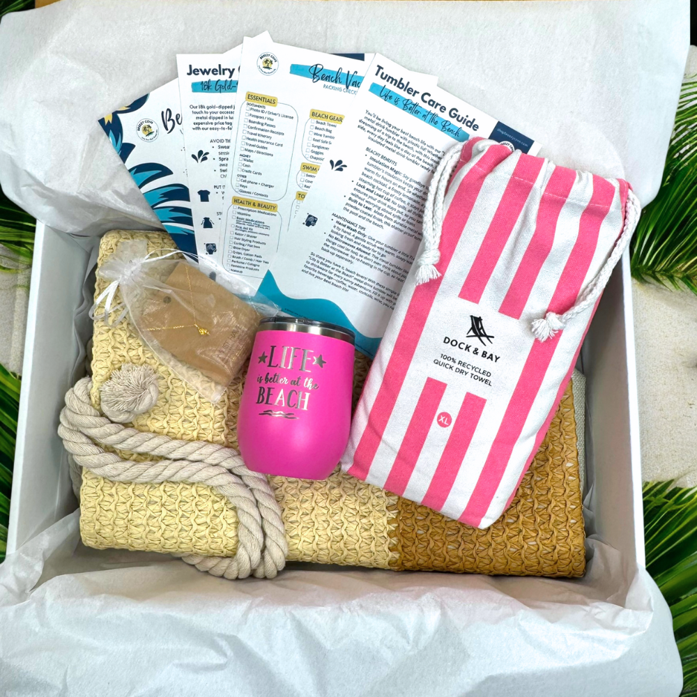 Pink Beach Lover Gift Set with pink striped towel, pink tumbler, gold conch shell necklace, and printed bonus cards in Breezy Cove gift box.
