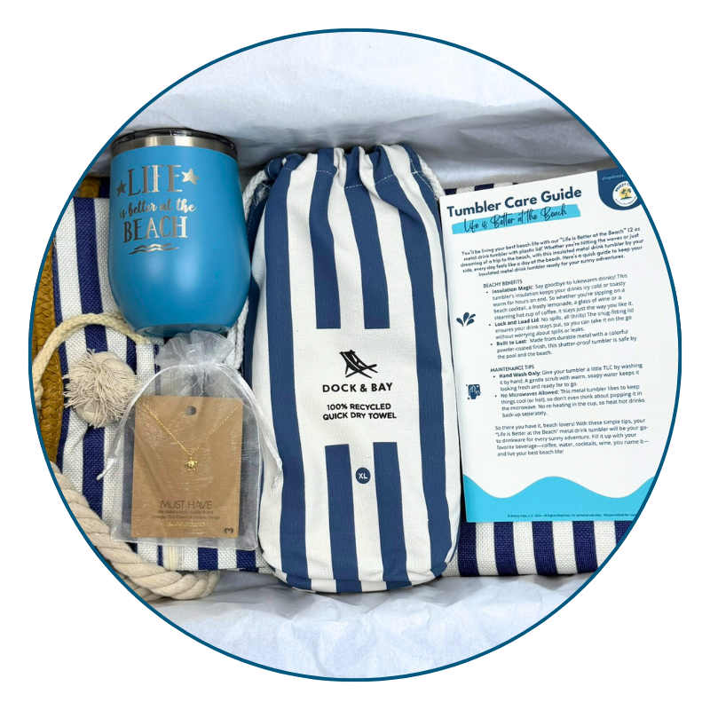 Navy Nautical Beach Lover Gift Set with striped towel, ocean blue tumbler, gold sea turtle necklace, and printed bonus cards in Breezy Cove gift box.