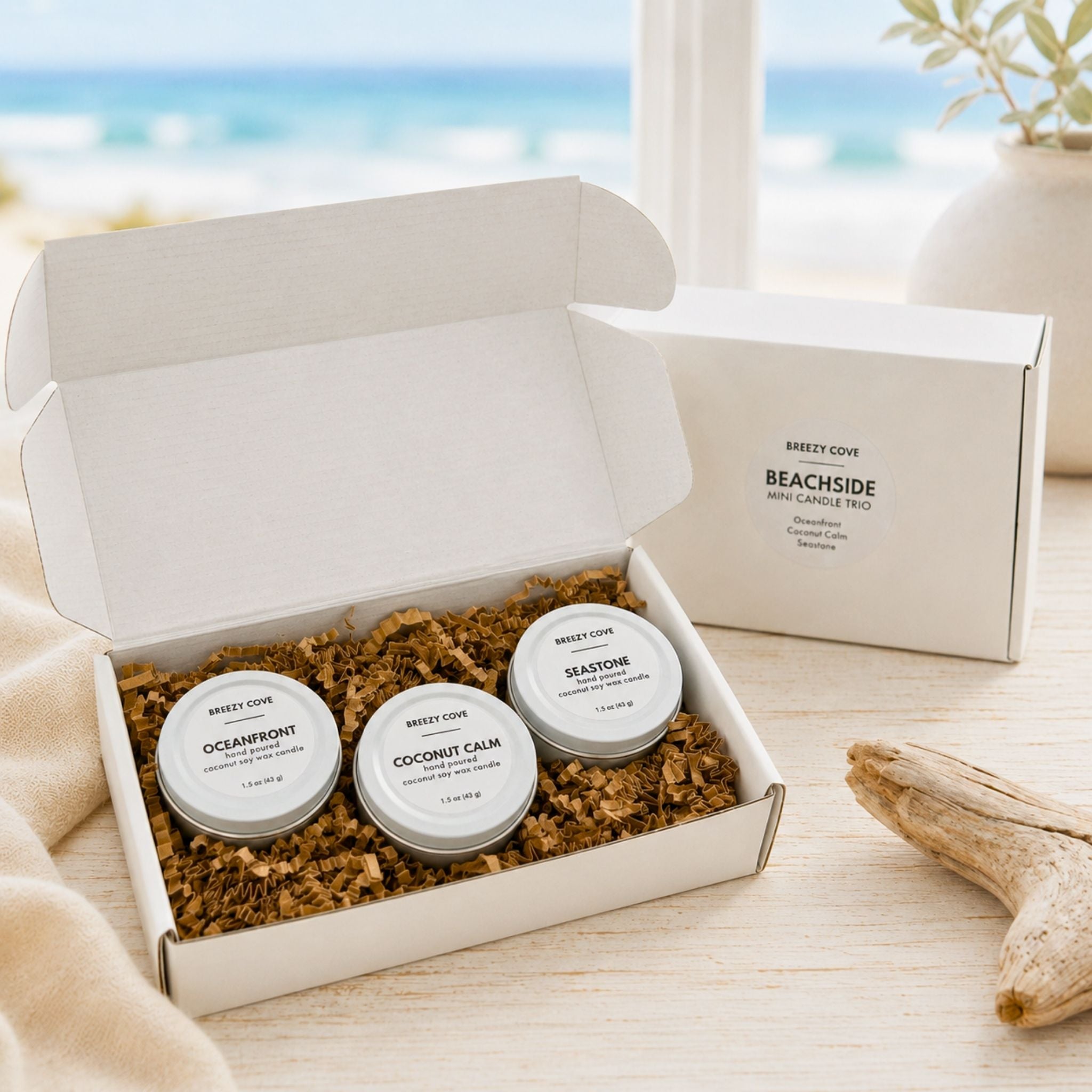 Gift-ready Beachside Mini Candle Trio candle gift set with three nontoxic beach candles packaged in a white box with coastal-inspired styling.
