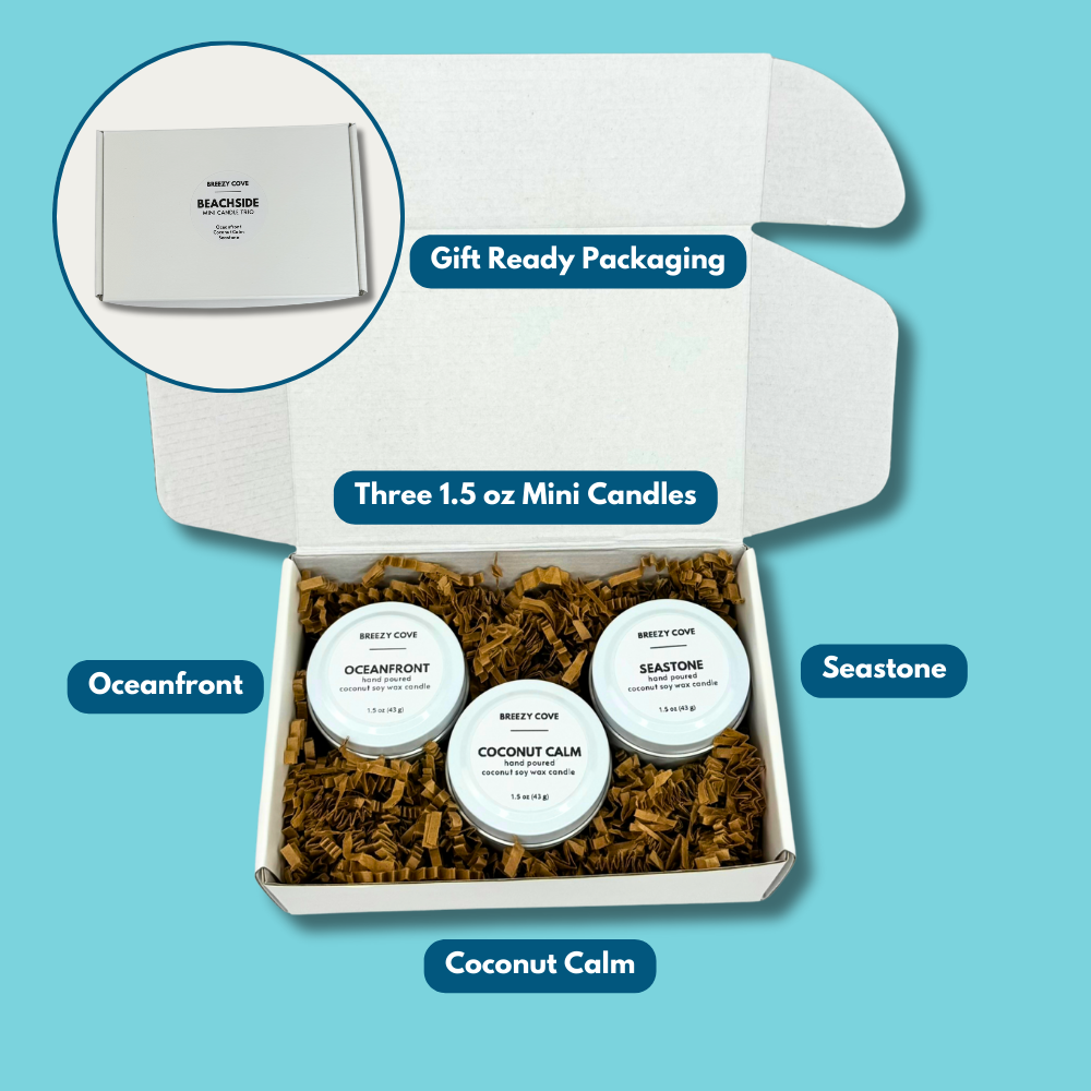 Beachside Mini Candle Trio gift set open box showing Oceanfront, Coconut Calm, and Seastone 1.5 oz candles with gift-ready packaging labels.