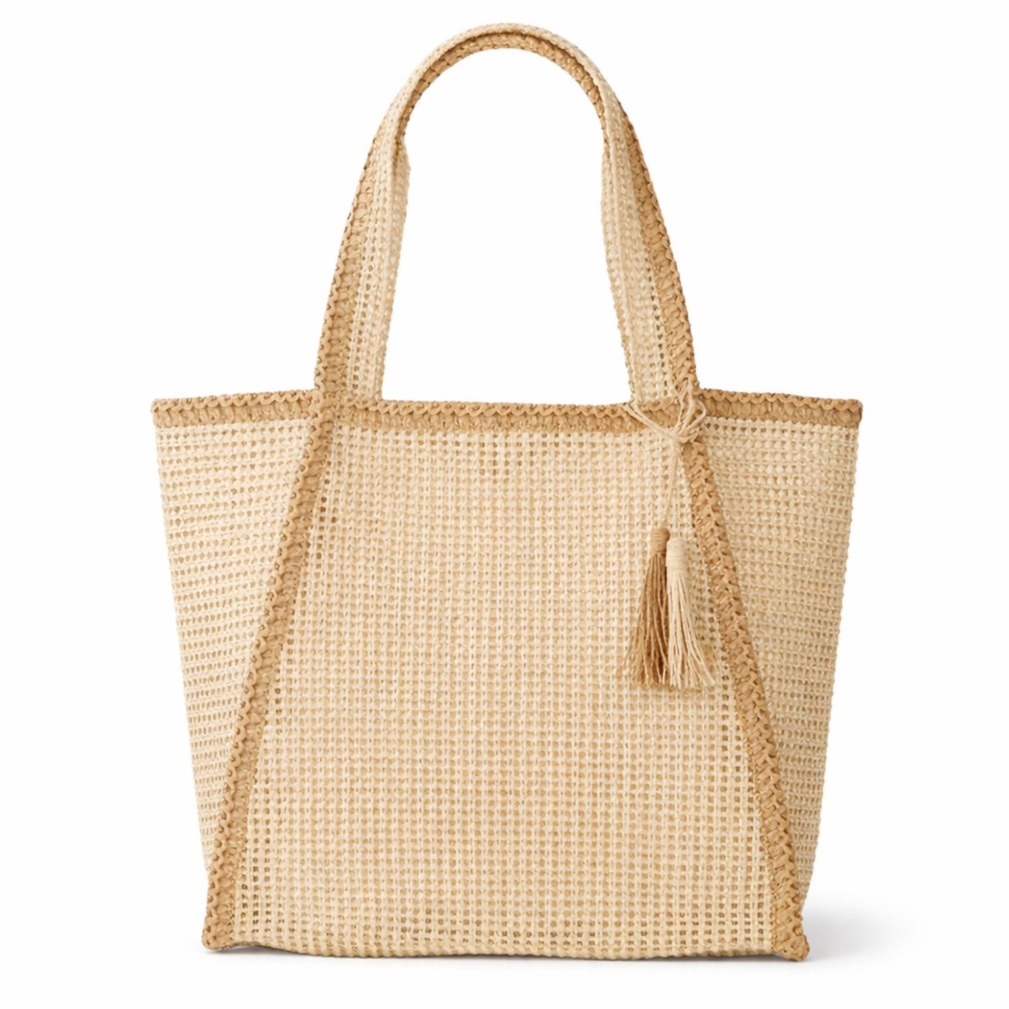 beige woven straw beach bag tote with tassel and magnetic closure on a white background