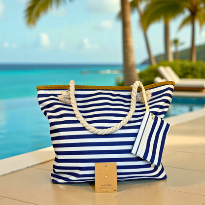 Navy striped beach bag with gold sea turtle necklace displayed poolside with turquoise ocean and palm trees — Breezy Cove Best Seller Bundle for effortless coastal style.