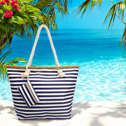 Stylish navy and white striped beach tote with rope handles, perfect for carrying towels, sunscreen, and essentials to the shore.