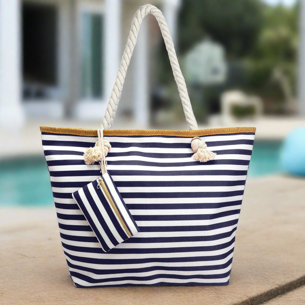 large, classic navy and white stripe pattern beach bag tote with rope handles on sandy beach, mother's day gift