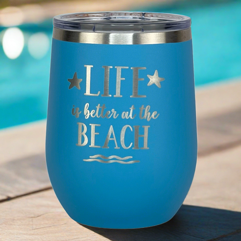 ocean blue, engraved, metal "Life is better at the beach" metal drink tumbler with lid is perfect for keeping drinks hot or cold