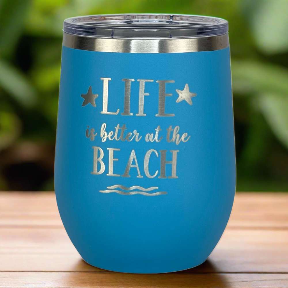 ocean blue, engraved, metal "Life is better at the beach" metal drink tumbler with lid is perfect for keeping drinks hot or cold