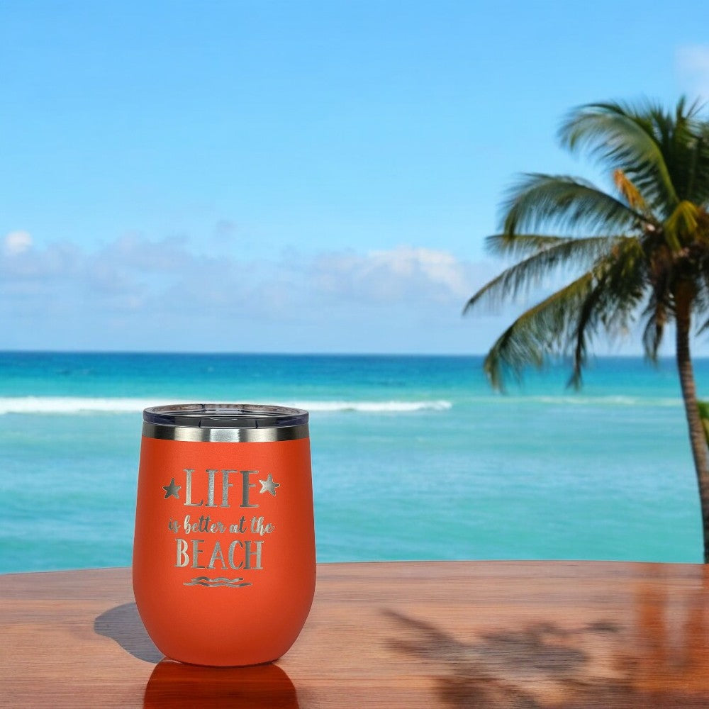 Beachy coral metal drink tumbler with insulated body, perfect for coffee, cocktails, or wine