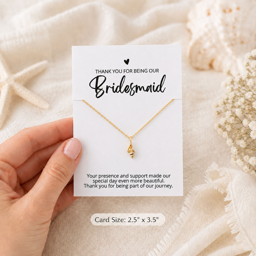 Bridesmaid beach wedding conch shell necklace gift shown in hand for size reference