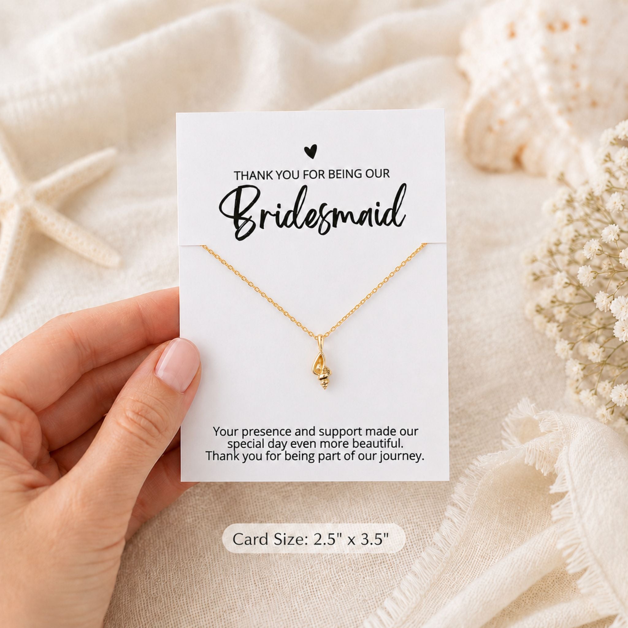 Bridesmaid beach wedding conch shell necklace gift shown in hand for size reference