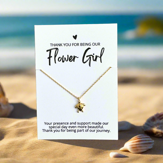 an 18k gold dipped sea turtle necklace on a bridesmaid thank you card for an affordable bridal party gift for beach wedding