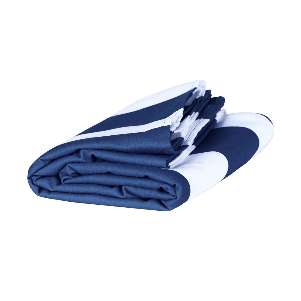 compactly folded navy blue and white striped quick dry Dock and Bay extra large beach towel