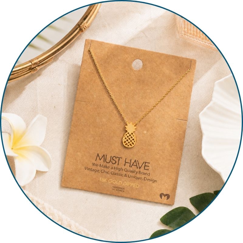 Gold pineapple necklace on jewelry card with white organza gift bag — 18k gold dipped tropical beach necklace ready to gift