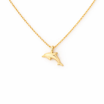 Detailed close-up of the 18k gold-dipped dolphin pendant necklace, highlighting its sleek design and shimmering finish