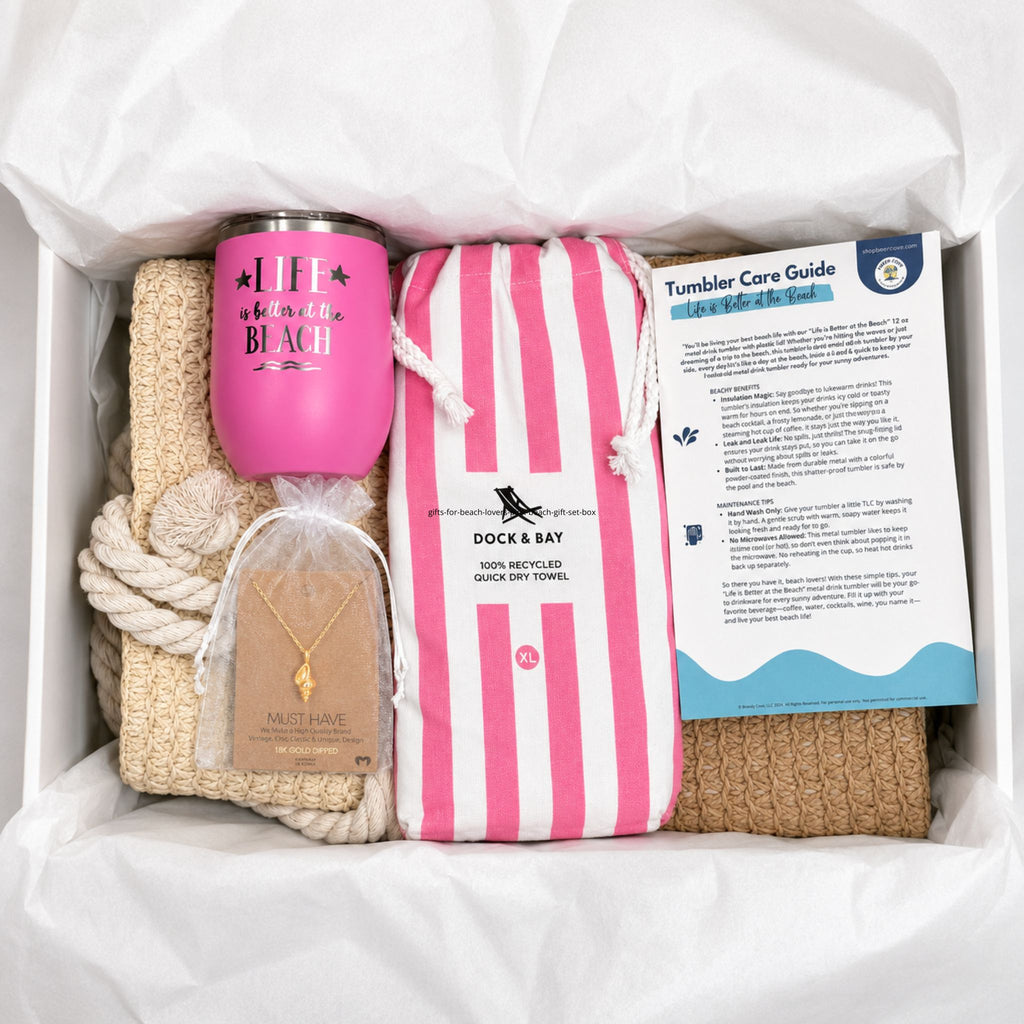 Pink beach gift set for beach lovers with straw beach bag, pink quick dry towel, pink tumbler, conch shell necklace, and care cards packaged in a gift box with tissue paper.
