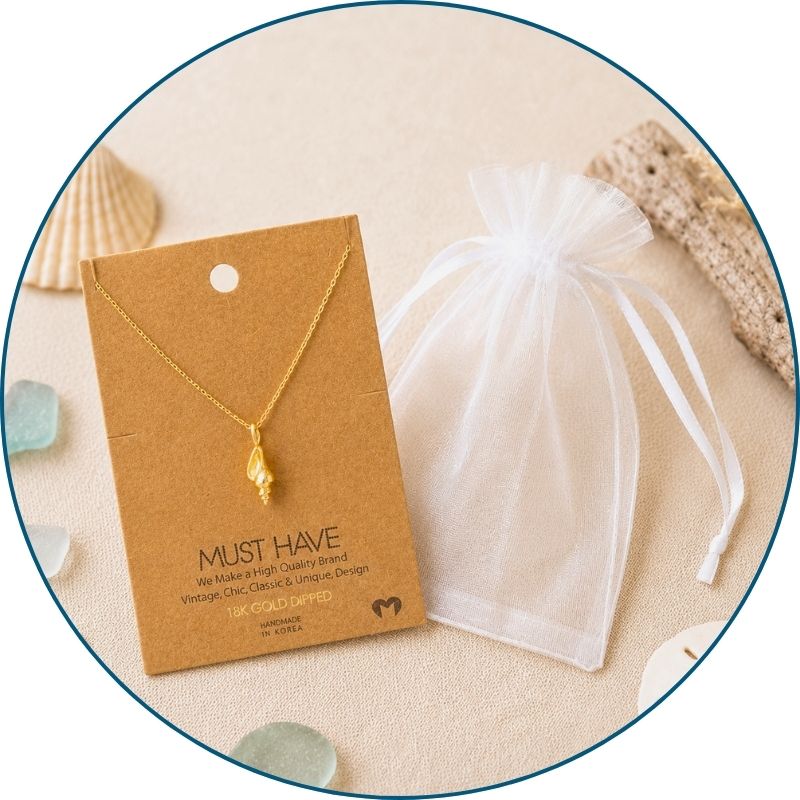 Gold conch shell necklace with a white organza gift bag — 18k gold dipped conch shell pendant necklace ready to gift