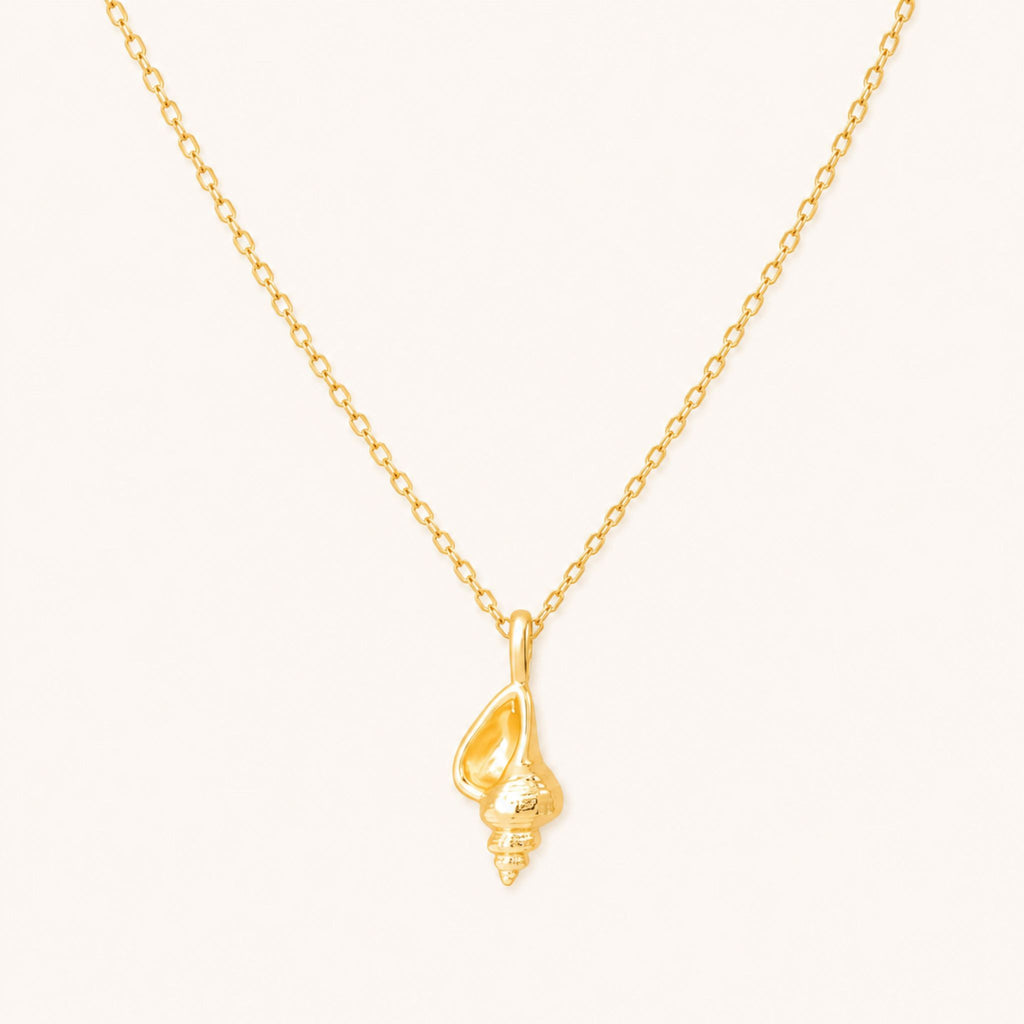 Gold conch shell pendant necklace on a 16-inch chain — 18k gold dipped conch shell jewelry on white background