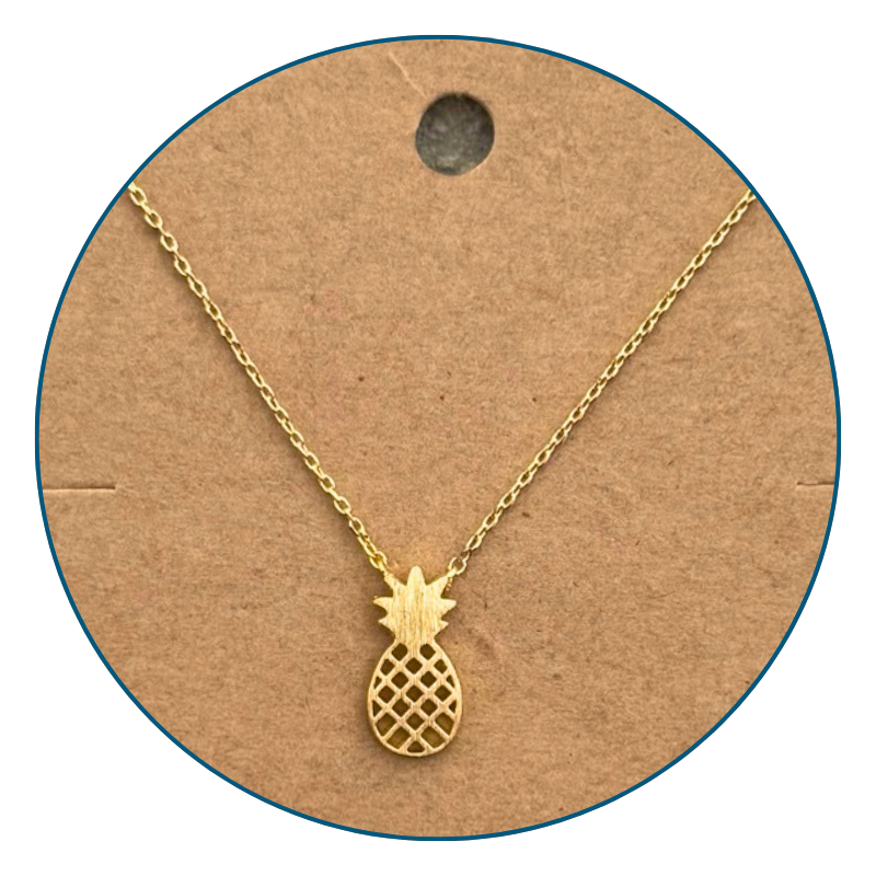 Close-up of 18k gold dipped pineapple necklace pendant with bright golden shine and polished finish.