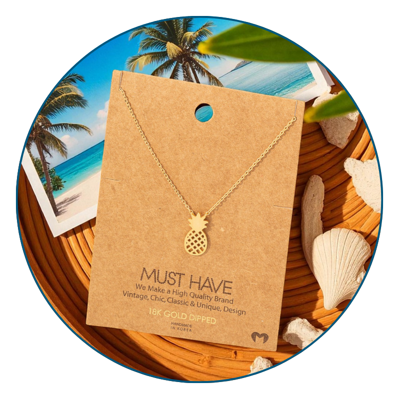 Dainty gold pineapple necklace styled for everyday wear with tropical-inspired details.