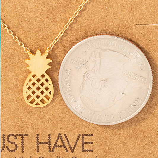pineapple pendant necklace in 18k gold – perfect for beach lovers showing dainty size next to a quarter