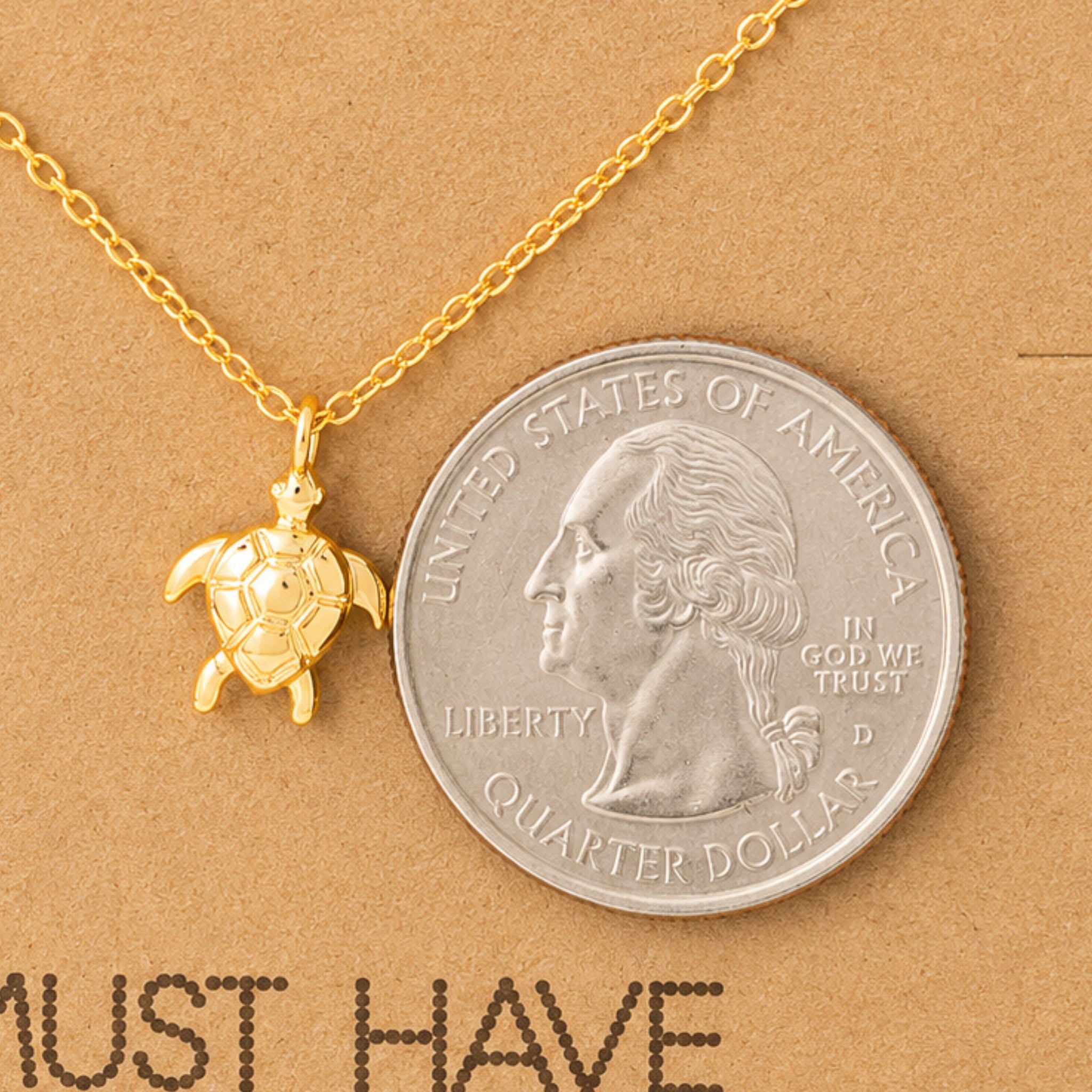 Gold sea turtle necklace size reference — dainty 18k gold dipped pendant on a delicate 16-inch chain for women