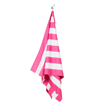 hanging bright hot pink and white striped quick dry Dock and Bay extra large beach towel