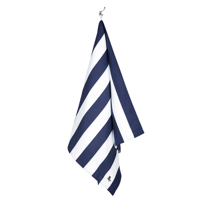 hanging navy blue and white striped quick dry Dock and Bay extra large beach towel