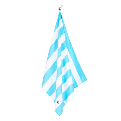 Hanging light blue striped extra large beach towel made with quick dry microfiber fabric