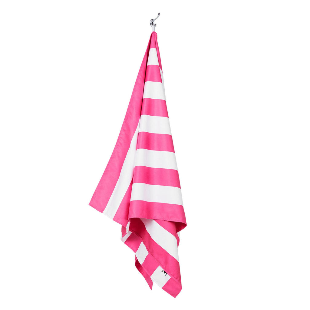 Hanging pink striped extra large beach towel made with quick dry microfiber fabric