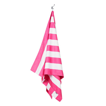 Hanging pink striped extra large beach towel made with quick dry microfiber fabric