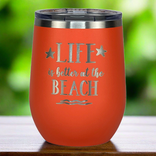 12 oz coral insulated tumbler, featuring a durable powder-coated finish and beach vibe
