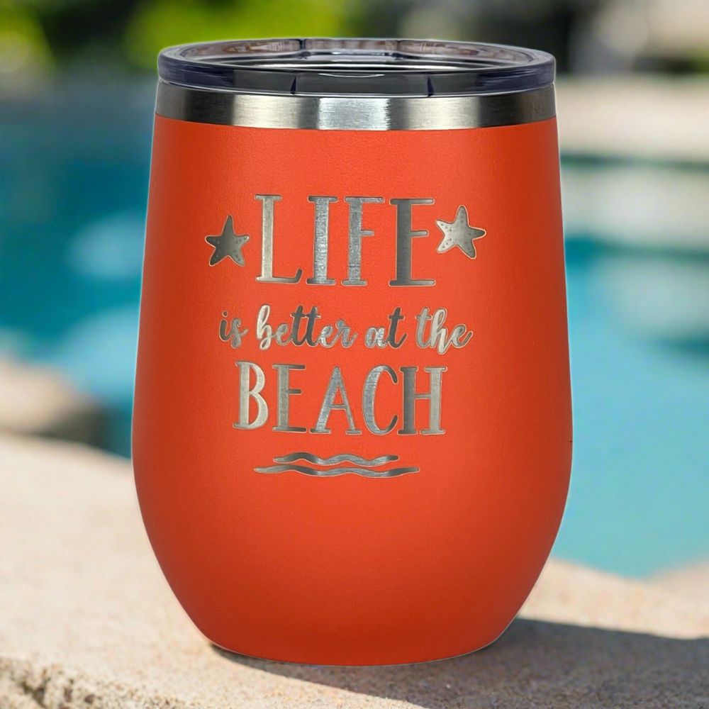 coral, engraved, metal, insulated 12 oz "Life is better at the beach" metal drink tumbler with lid is perfect for keeping drinks hot or cold