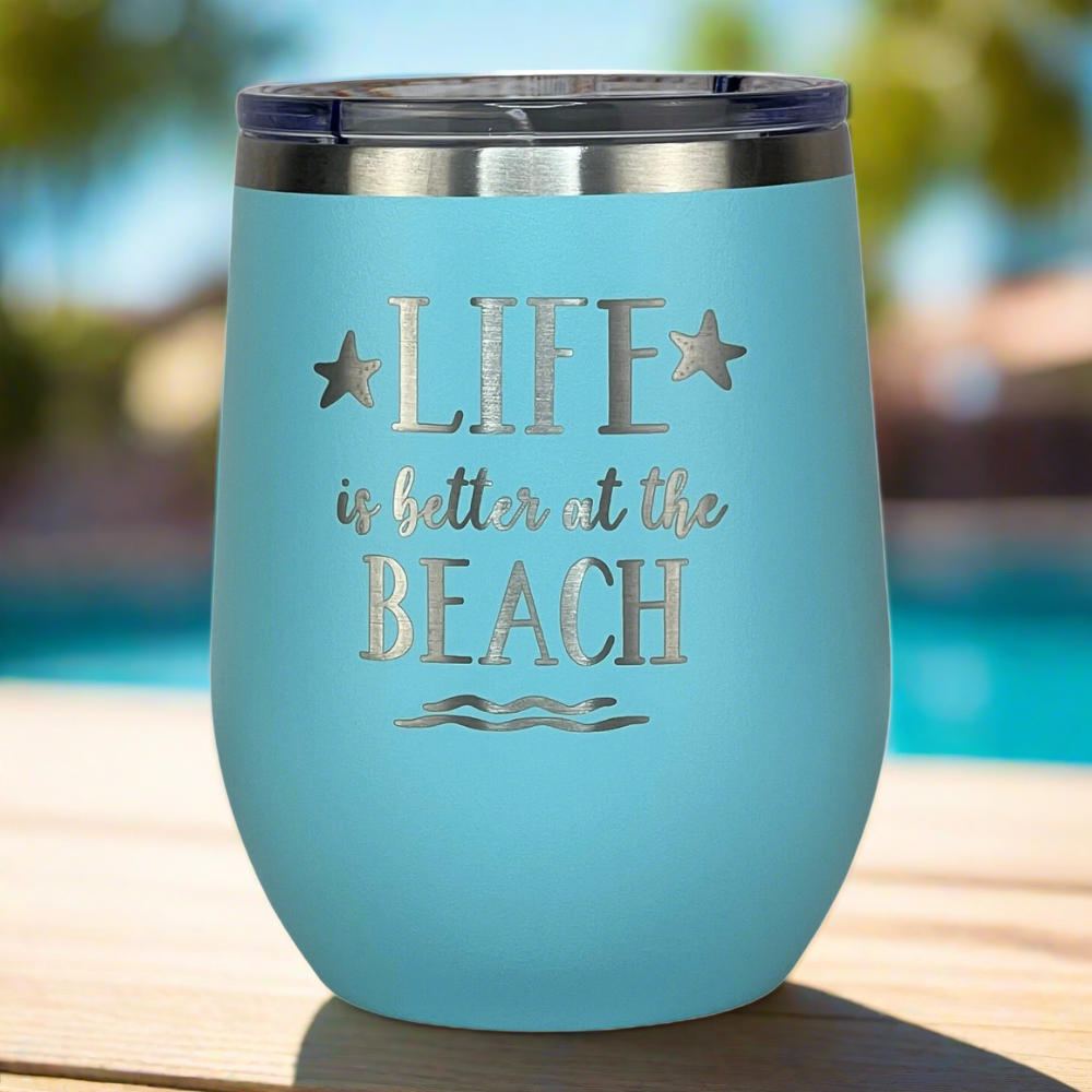 12 oz teal, engraved, "Life is better at the beach" insulated metal drink tumbler with lid keeps drinks hot or cold