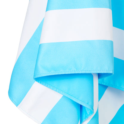 Close-up of light blue striped microfiber beach towel fabric and edge detail