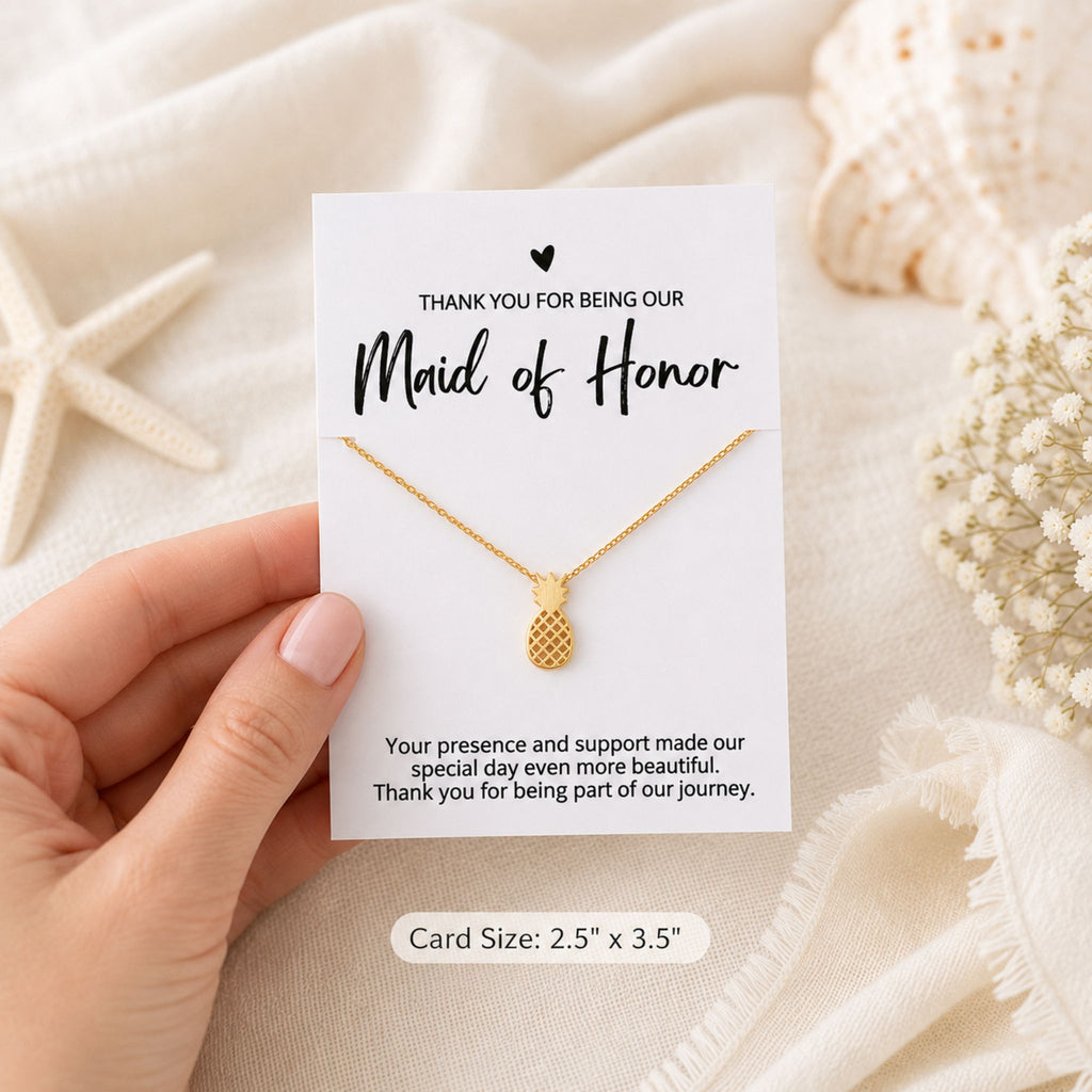 Maid of Honor beach wedding pineapple necklace gift shown in hand for size reference
