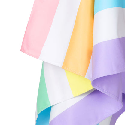 Close-up of pastel striped microfiber beach towel fabric and edge detail