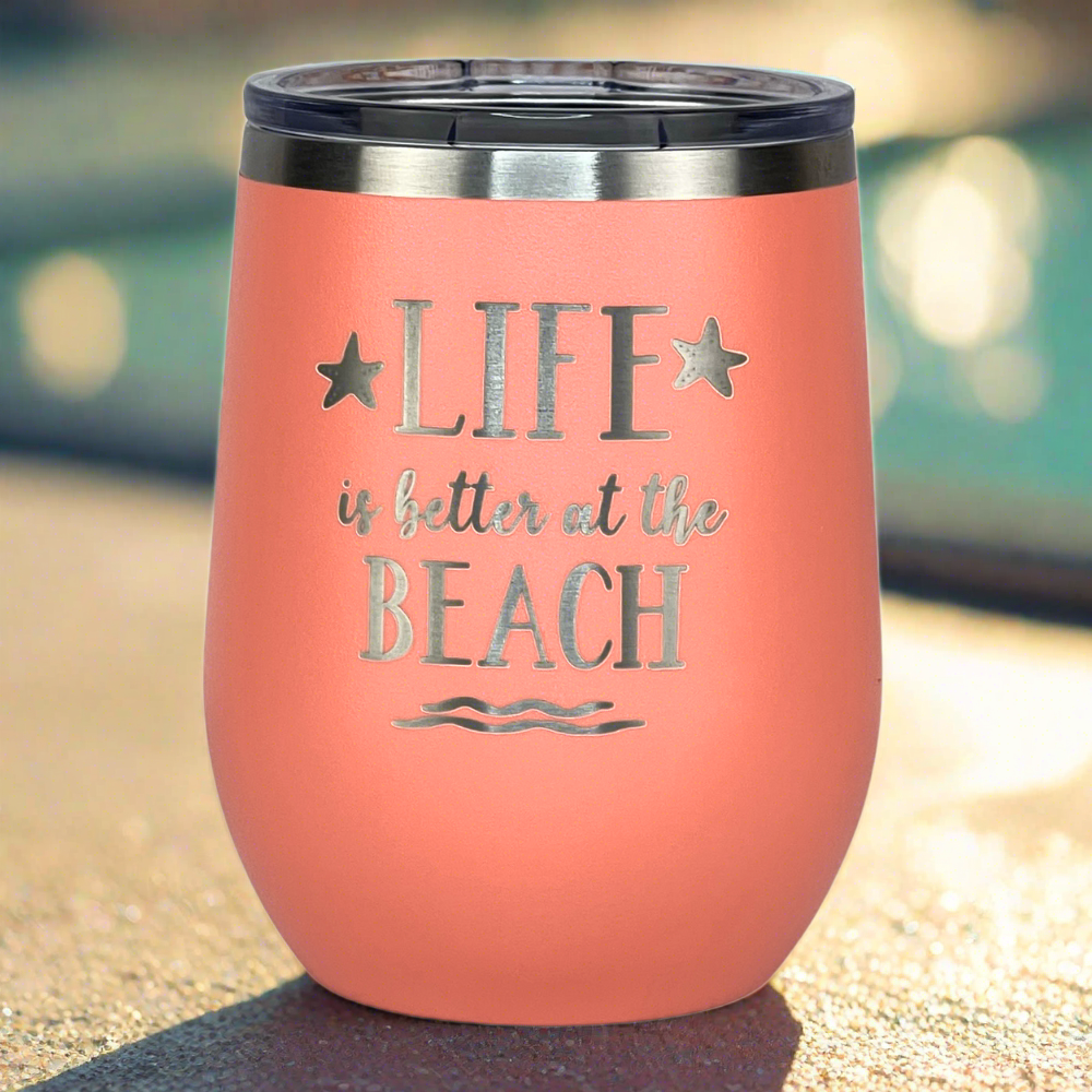 peach, engraved, metal, insulated 12 oz "Life is better at the beach" metal drink tumbler with lid is perfect for keeping drinks hot or cold