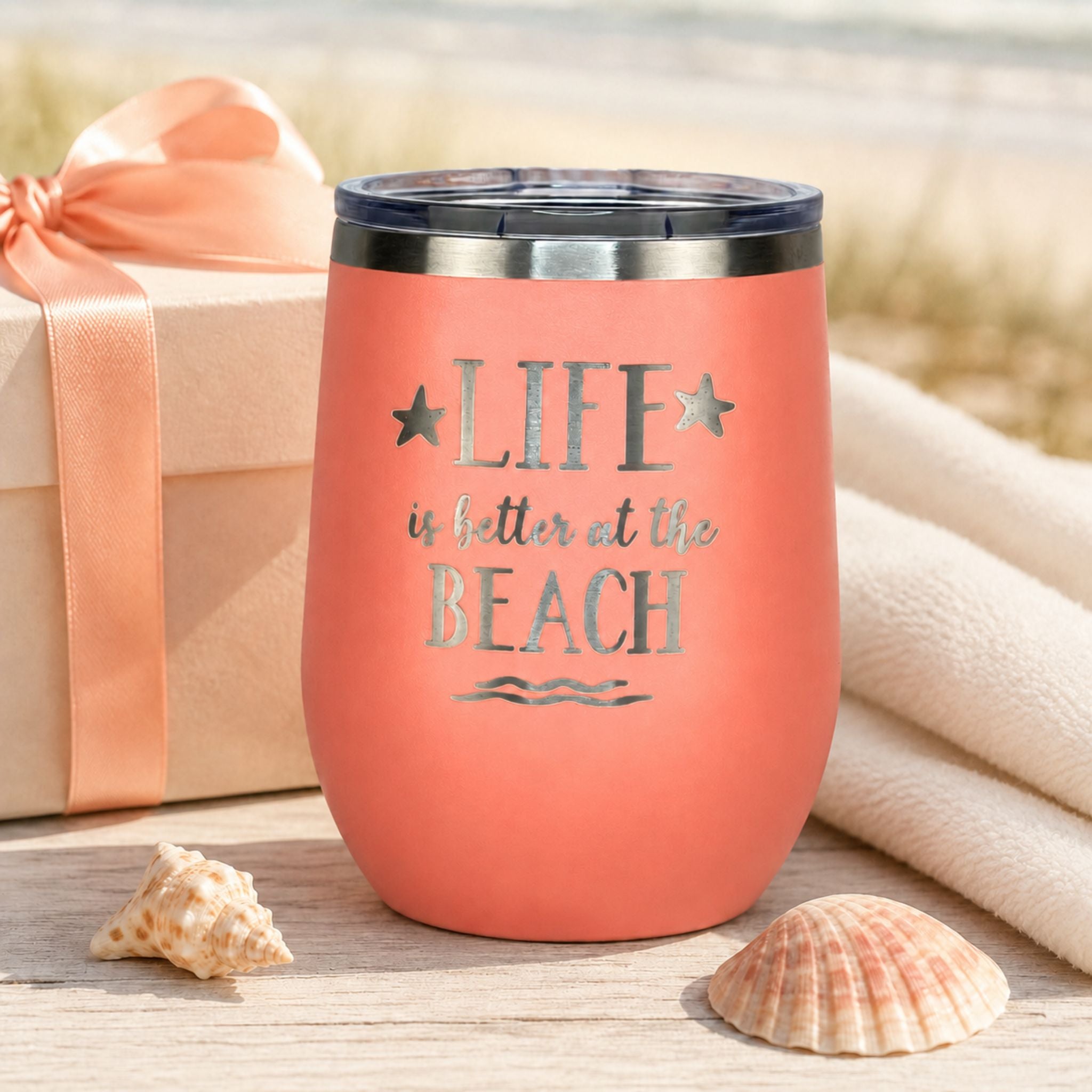 Peach stainless steel wine tumbler styled as a thoughtful beach lover gift