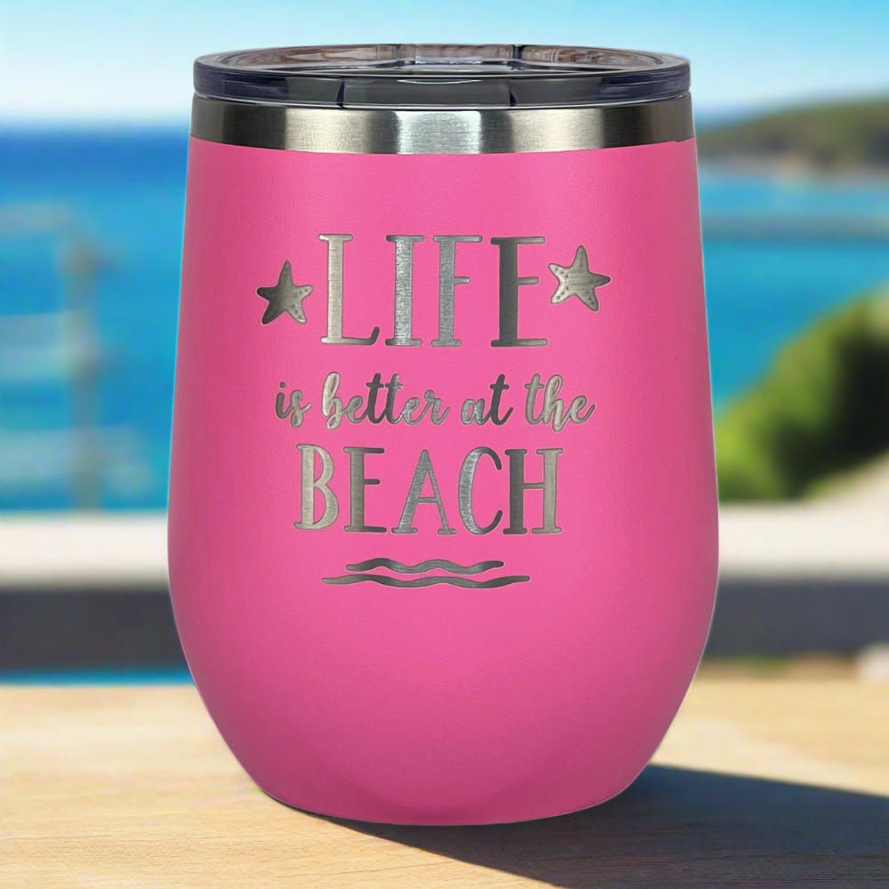 12 oz pink, engraved, "Life is better at the beach" insulated metal drink tumbler with lid keeps drinks cold by the beach