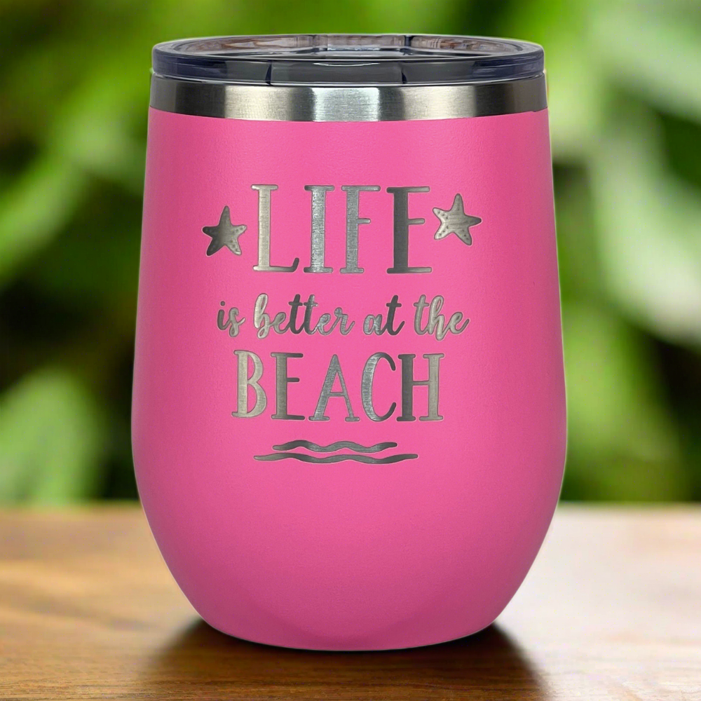 12 oz pink, engraved, "Life is better at the beach" insulated metal drink tumbler with lid keeps drinks hot or cold